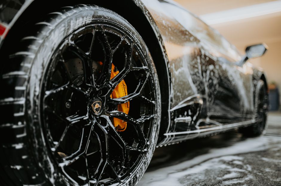 A shiny clean luxury car after a premium car wash